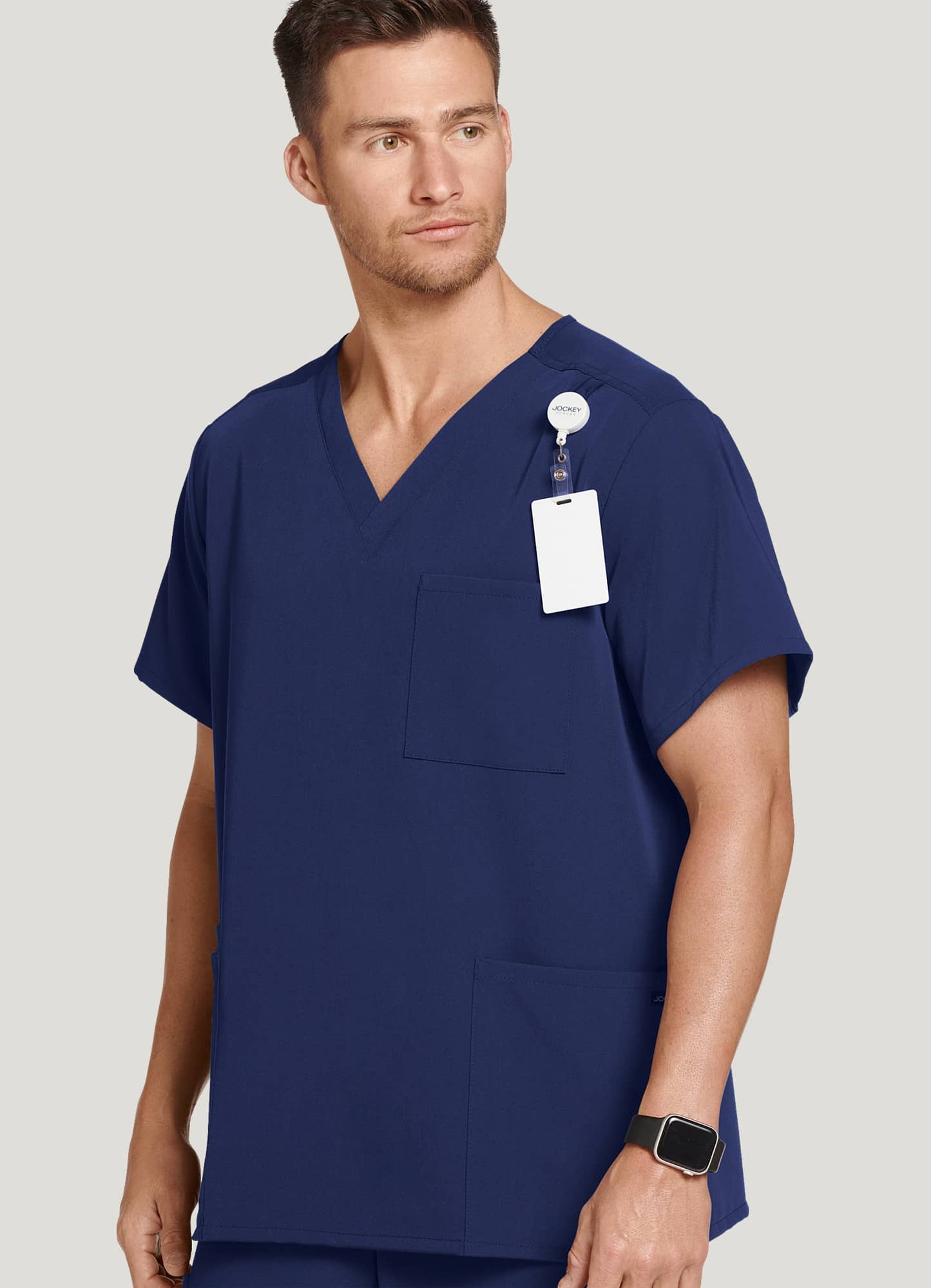 Jockey® Unisex Four Pocket Scrub Top